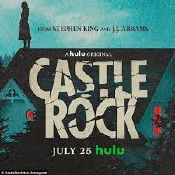 a shadow of a woman on a cliff, which reads Castle Rock.