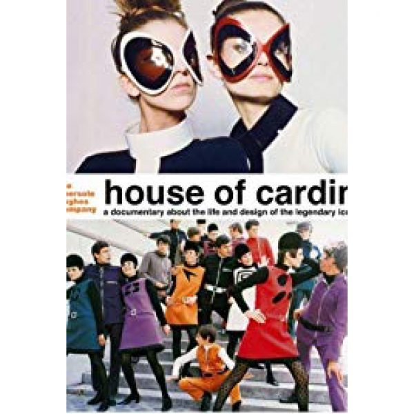 Models wearing large butterfly shaped glasses, and other models wearing vibrantly colored oversized clothing
