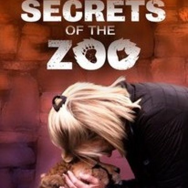 Woman with her forehead touching the head of a lion under the title